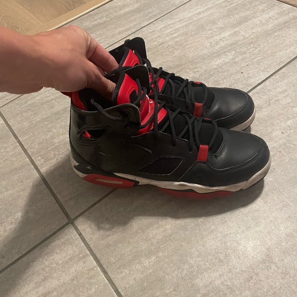 Jordan Black and Red kids sneakers
Worn for two months